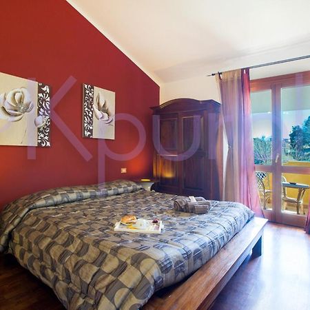 Le Api Hotel Cagliari Bagian luar foto