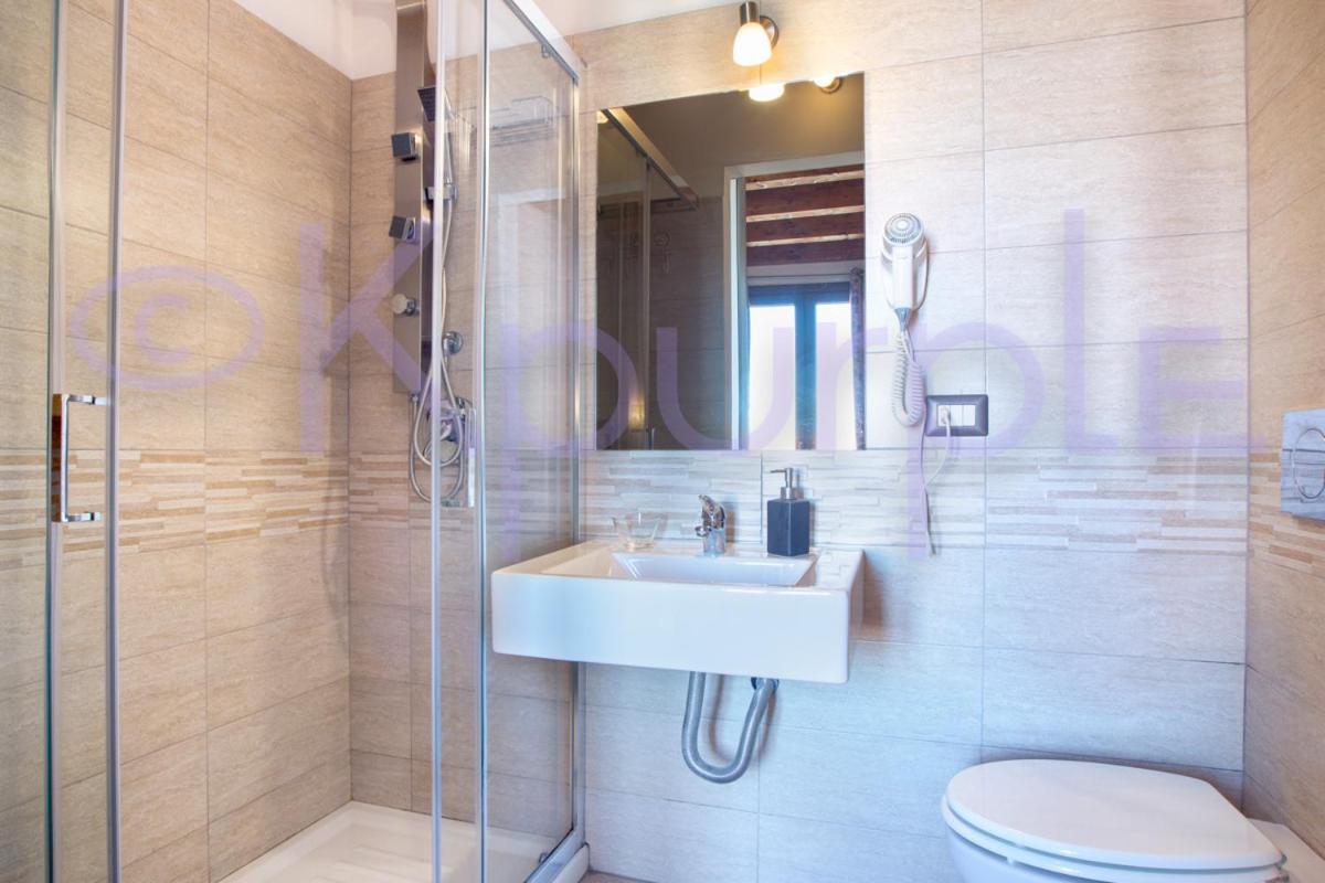 Le Api Hotel Cagliari Bagian luar foto
