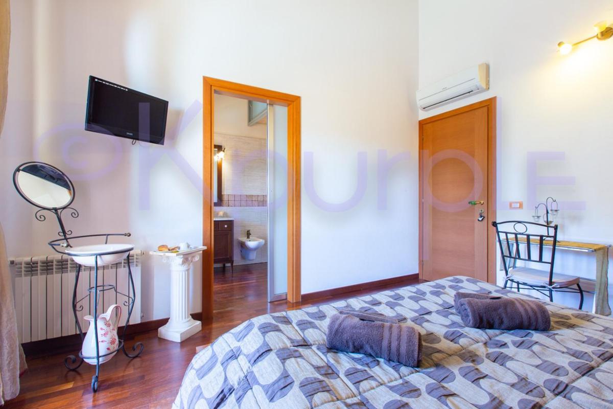 Le Api Hotel Cagliari Bagian luar foto