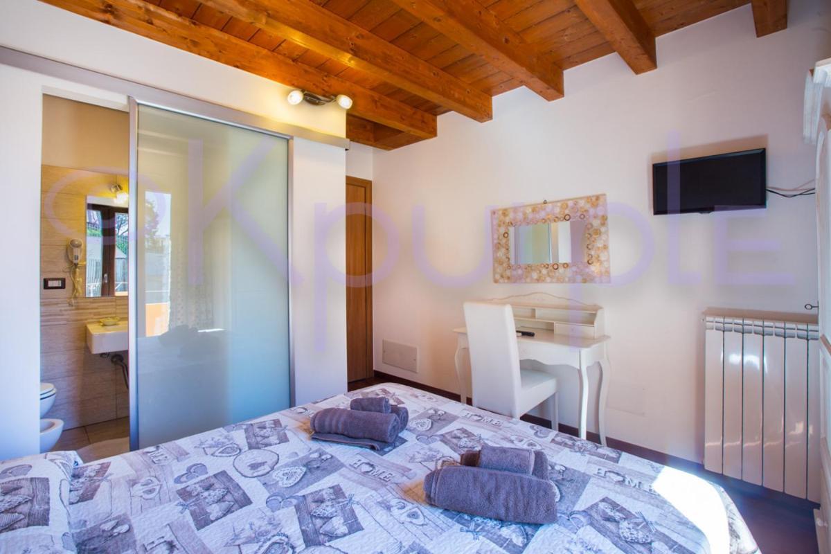 Le Api Hotel Cagliari Bagian luar foto