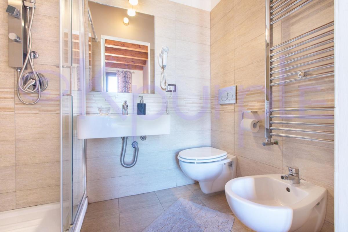 Le Api Hotel Cagliari Bagian luar foto