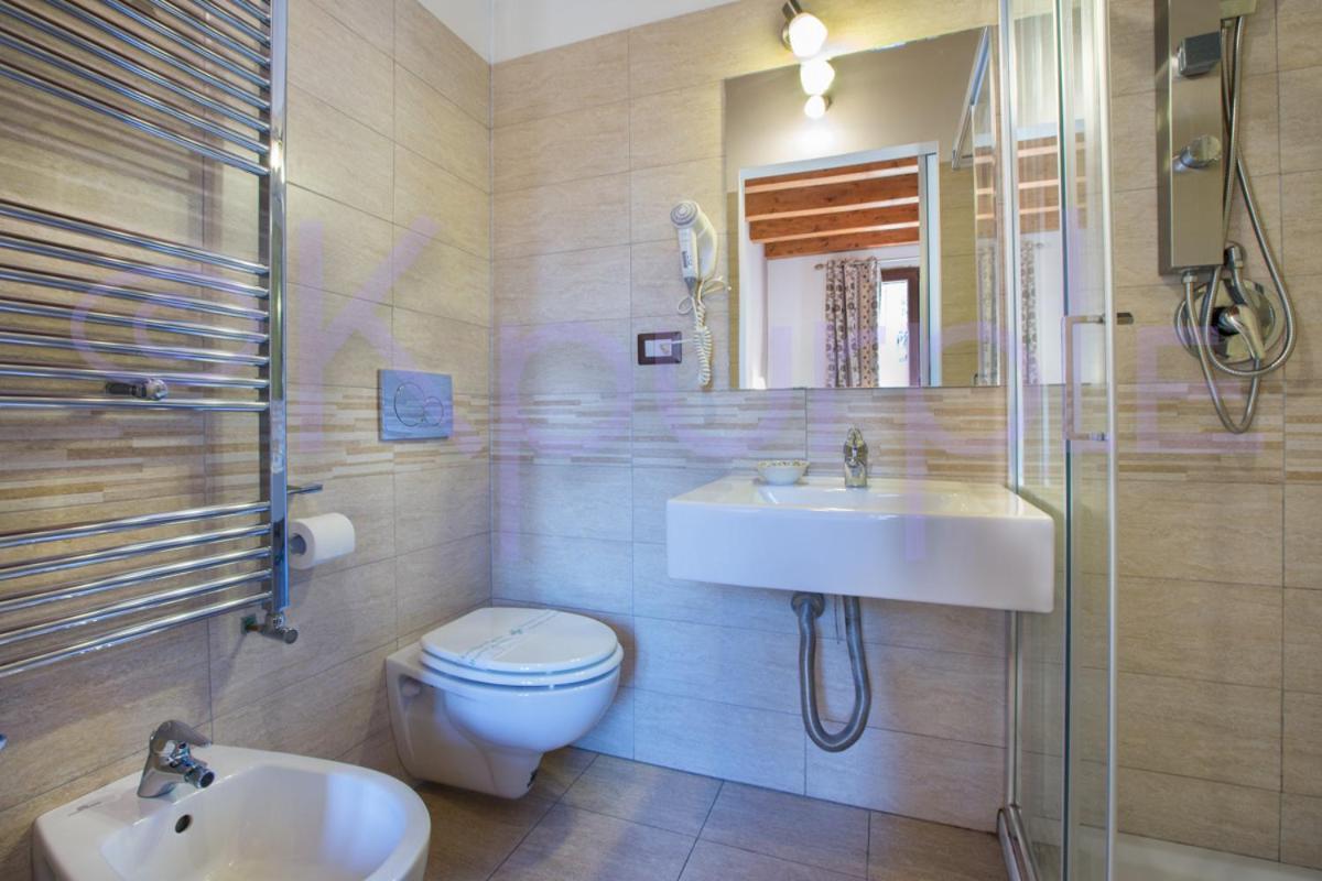 Le Api Hotel Cagliari Bagian luar foto