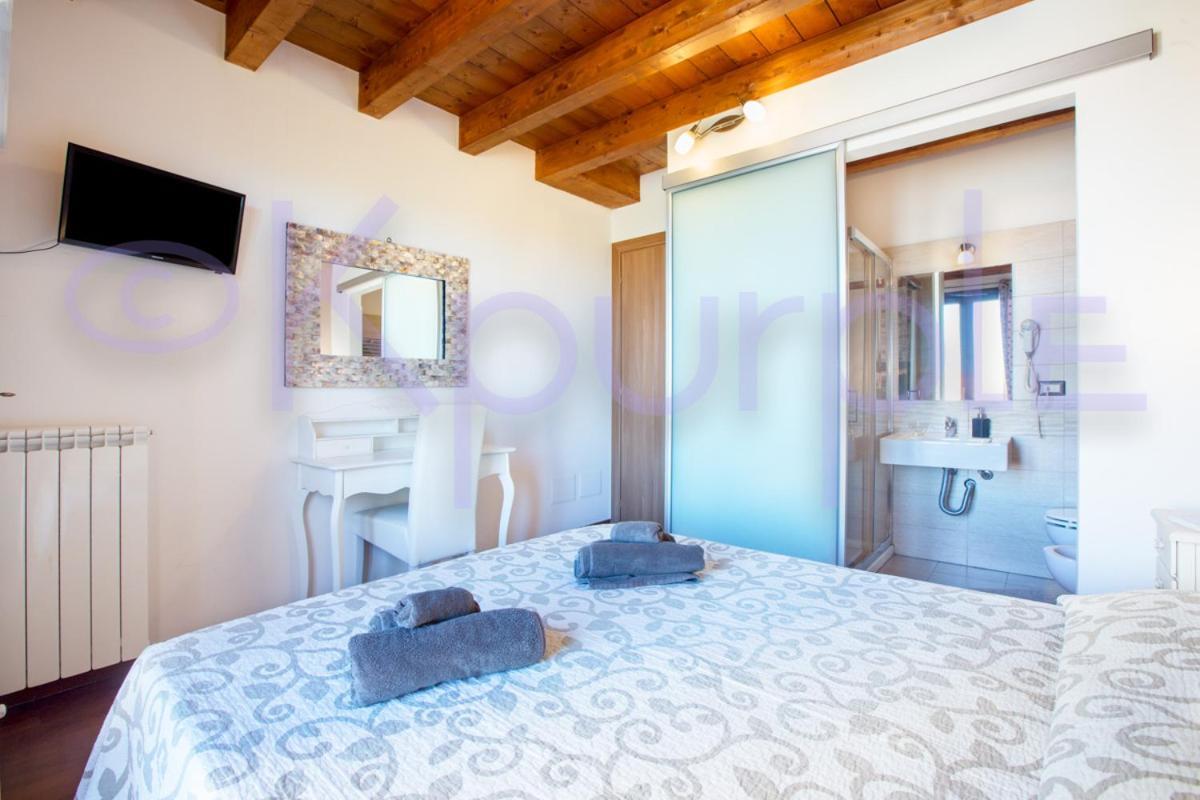 Le Api Hotel Cagliari Bagian luar foto